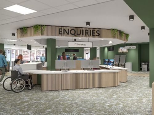 A person sitting at a reception desk
AI-generated content may be incorrect.